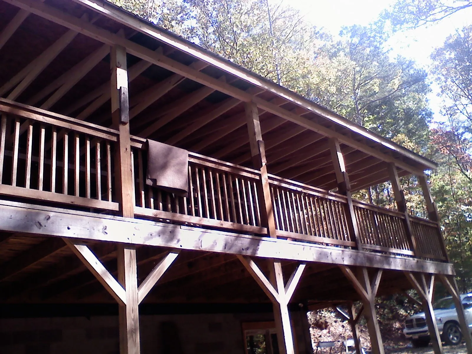 Timber framing under a new elevated porch and deck — Roof Leak Repair in Alexandria by Roofing Brothers